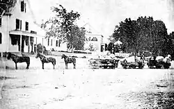 A three-car, horse-drawn train on the Granite Railway at East Milton Square c1855 (another source says c1840).
