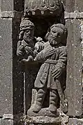The south porch at Guimiliau. Part of the piédroit on the right depicts Cain's murder of Abel