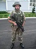 Montenegrin soldier holding a HK MP5