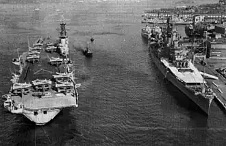 USS Newport News and HMCS Bonaventure (CVL-22) at Halifax in 1962.