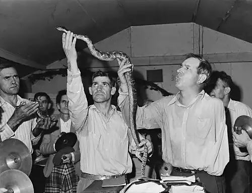 Image 9Snake handling in Christianity, by Russell Lee (restored by Adam Cuerden) (from Wikipedia:Featured pictures/Culture, entertainment, and lifestyle/Religion and mythology)