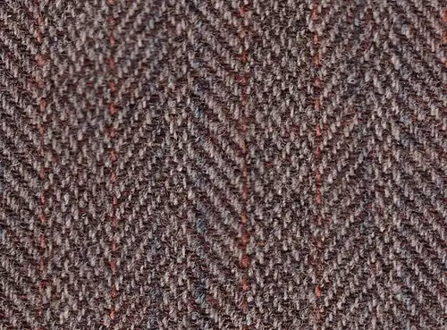 Tweed fabric in a herringbone weave, used for suits and hats