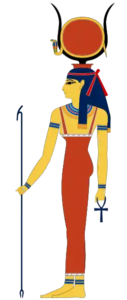 Profile of a woman in ancient Egyptian clothing. She has yellow skin and bears on head a pair of cow horns, between which sits a red disk encircled by a cobra. She holds a forked staff in one hand and an ankh sign in the other.