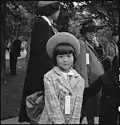 Japanese American girl, waiting for transport