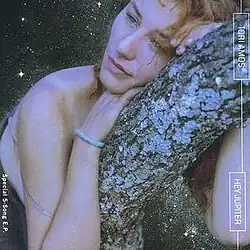 Hey Jupiter US EP cover art featuring Tori Amos staring into the distance leaning on a tree branch