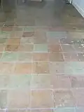 Acid-stained decorative concrete floor in basement