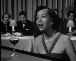 Brooks as the singer of "I Hadn't Anyone Till You" in the film In a Lonely Place (1950)