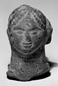 Head of an Indian Village Deity, terracotta, 3rd century BCE