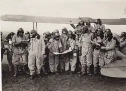 At Prestwick, Dutt is second from right in front row holding a map