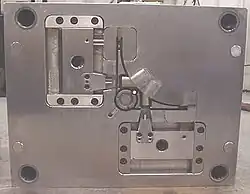 "B" side of die with side pull actuators