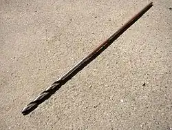 A 3⁄8 in × 18 in (9.5 mm × 457.2 mm) installer bit