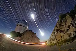 Long exposure of the eclipse above the Nicholas U. Mayall Telescope in Tucson, Arizona