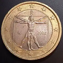Italian 1 Euro coin 2002. The design shows the famous drawing by Leonardo da Vinci, displayed in the gallery of the Academy in Venice, illustrating the ideal proportions of the human body.