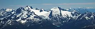Joffre Group seen from Mount Marriott. Joffre Peak (left), Mt. Matier (highest), and Slalok Mountain (right). Mount Chief Pascall is located in lower left corner (see file annotations).