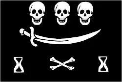 Another flag design by Dulaein, described as “Figures of heads cut off (ie skulls) with a cutlass, piles of bones and hourglasses”. Made out of a fabric called “Ras de St. Maur” - a fine fabric either of wool or silk made in the town of St. Maur - Flag measurement: 22 ft 9in long, 14 ft 9in wide[25]