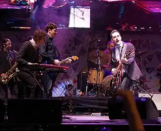 The Uruguayan musician Jorge Drexler with Luciano Supervielle (left on keyboards) and John Campodónico (center guitar), giving a concert on the stage of the gaucho (intersection of Calle 18 de Julio and Constituyente, Montevideo), during the Bicentennial celebrations in Uruguay on 10 October 2011.