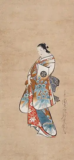Standing portrait of a courtesan Ink and colour painting on silk, Kaigetsudō Ando, c. 1705–10