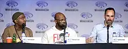 Keith Knight, Marshall Todd and Anthony King speaking at the 2022 WonderCon, for "Woke", at the Anaheim Convention Center in Anaheim, California.