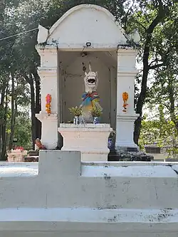 Lion statue facing north