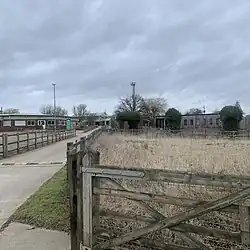 Entrance road leading to the Kings Bush Farm site