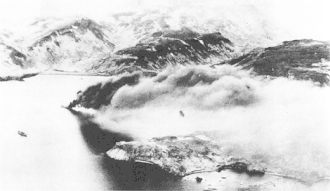 Japanese transport ship burning off Kiska, Alaska, after U.S. attack on 18 June 1942