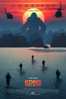 film poster showing Kong towering over mountains with the sun behind him, as well as military soldiers and helicopters slowly approaching him.