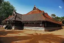 Most Kerala buildings visually appear to have low height, due to over-sloping of roofs, which protect walls from rain and direct sunshine.