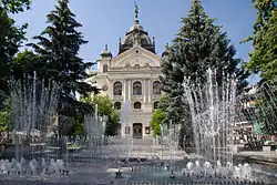 Košice State Theatre seen from park with fountains