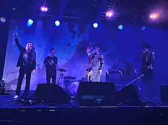 Kula Shaker's founding members in 2024 Left to right: Jay Darlington, Paul Winterhart, Crispian Mills, Alonza Bevan