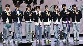 Lun8 in March 2024 L-R: Junwoo, Ji Eun-ho, Dohyun, Takuma, Ian, Jinsu, Chael, Eunseop (former)