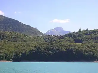 The village seen from the Lac du Sautet [fr]
