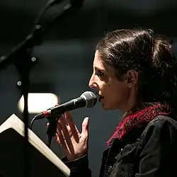 Gauthier reading at The Lieu Unique in Nantes in 2019