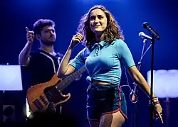 Lawrence performing on stage