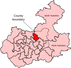 A very large constituency. It consists of the eastern portion of the county. It also includes the entirety of a second, smaller county, located to the east of the larger county.