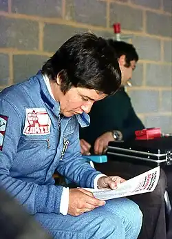 Lella Lombardi in the pit garage during the 6 hour Silverstone race, 1976