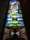 Part of the large Leonard French stained glass mosaic windows on the southern border of the Sanctuary wall.