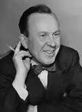 Lester B. Pearson holding a pencil