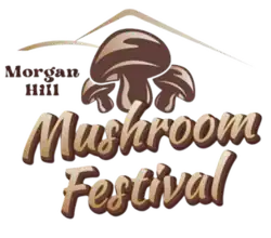 Three drawn, brown mushrooms are below two brown, curvy lines. The words "Mushroom Festival" are below the cartoon mushrooms.