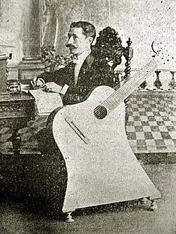 Luis Soria Iribarne and his "guitarpa"