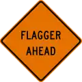 CW20-7a Flagger ahead (text sign)
