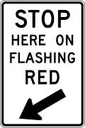 R10-14b Stop here on flashing red