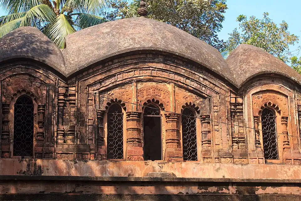 View of the upper part of the temple with a double-sloped roof
