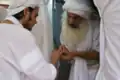 An initiate receiving a sacred gold ring called Shom Yawar Ziwa