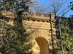Stonework with the words Meridian Hill inscribed into the wall