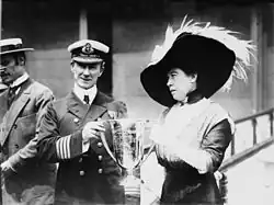 Margaret Brown (right) giving Captain Arthur Henry Rostron a golden award for his service in the rescue of Titanic's survivors