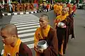 Mahāyāna monks performing alms round before the 2010 Vesak holiday in Magelang City, Central Java, Indonesia
