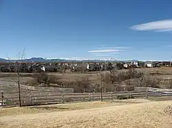 Houses in Westminster with the Front Range in the background.