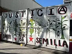 A door painted with multiple corn plants.