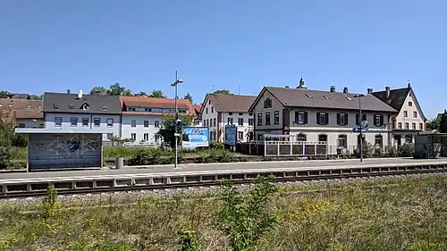 Station with island platform and two tracks