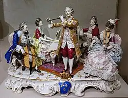 Group of musicians in 18th-century costume, late 19th to early 20th century